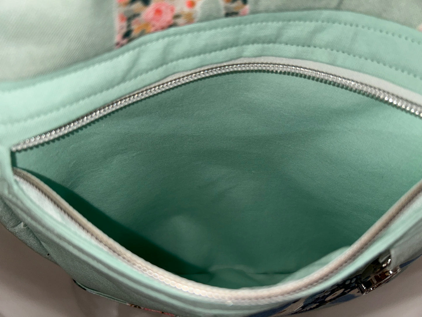 Floral Pups Reporter Sling Bag
