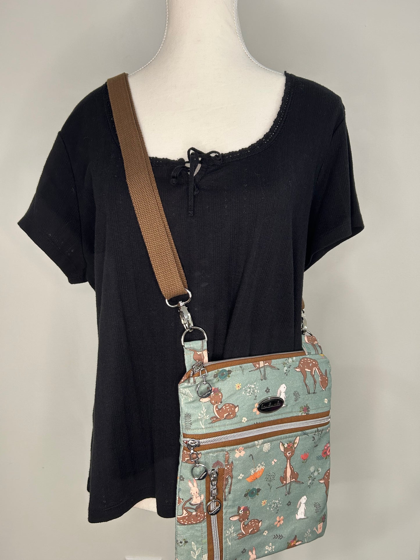 Deer-ly Doe’s Triple Zip Crossbody Bag